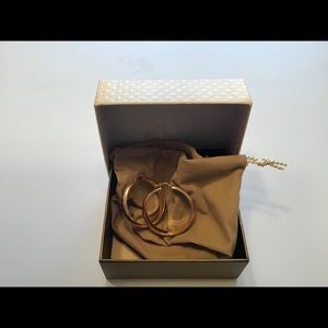 Bronzo Italia golden covered bronze hoops.